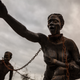 Sculpture by Ghanaian artist Kwame Akoto Bamfo at the beginning of the National Memorial to Peace and Justice